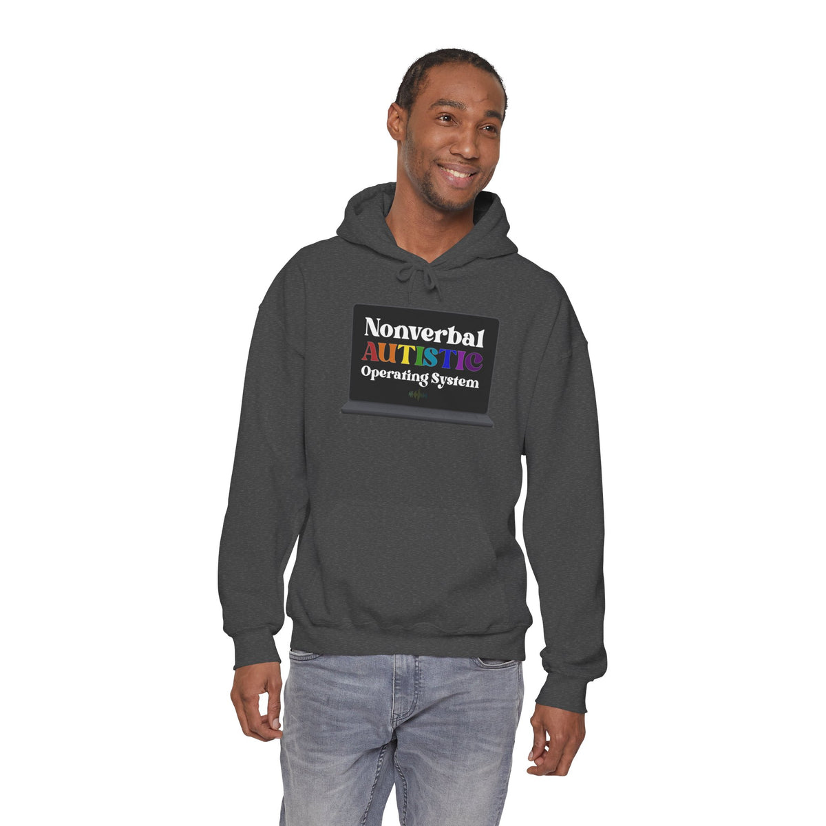 Adult model wearing a dark heather pullover hoodie with the bold rainbow “Nonverbal AUTISTIC Operating System” laptop graphic, front view — EOWD Autism Living