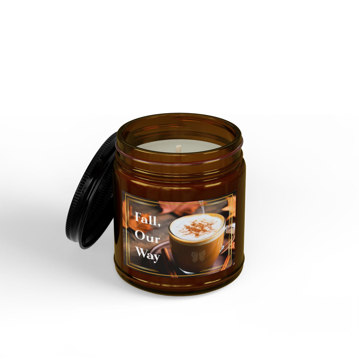 4 oz amber soy candle jar with a black open lid and “Fall, Our Way” label showing a warm drink — EOWD Autism Living
