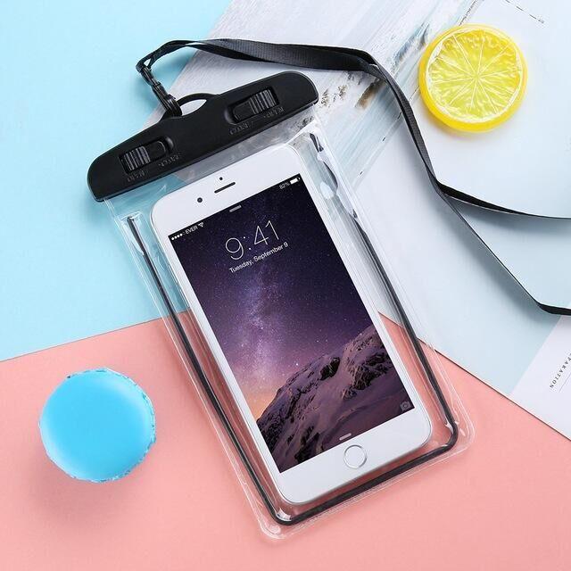 STEVVEX waterproof phone pouch with strap in black shown with phone inside on pink background — STEVVEX Gadgets via EOWD Autism Living