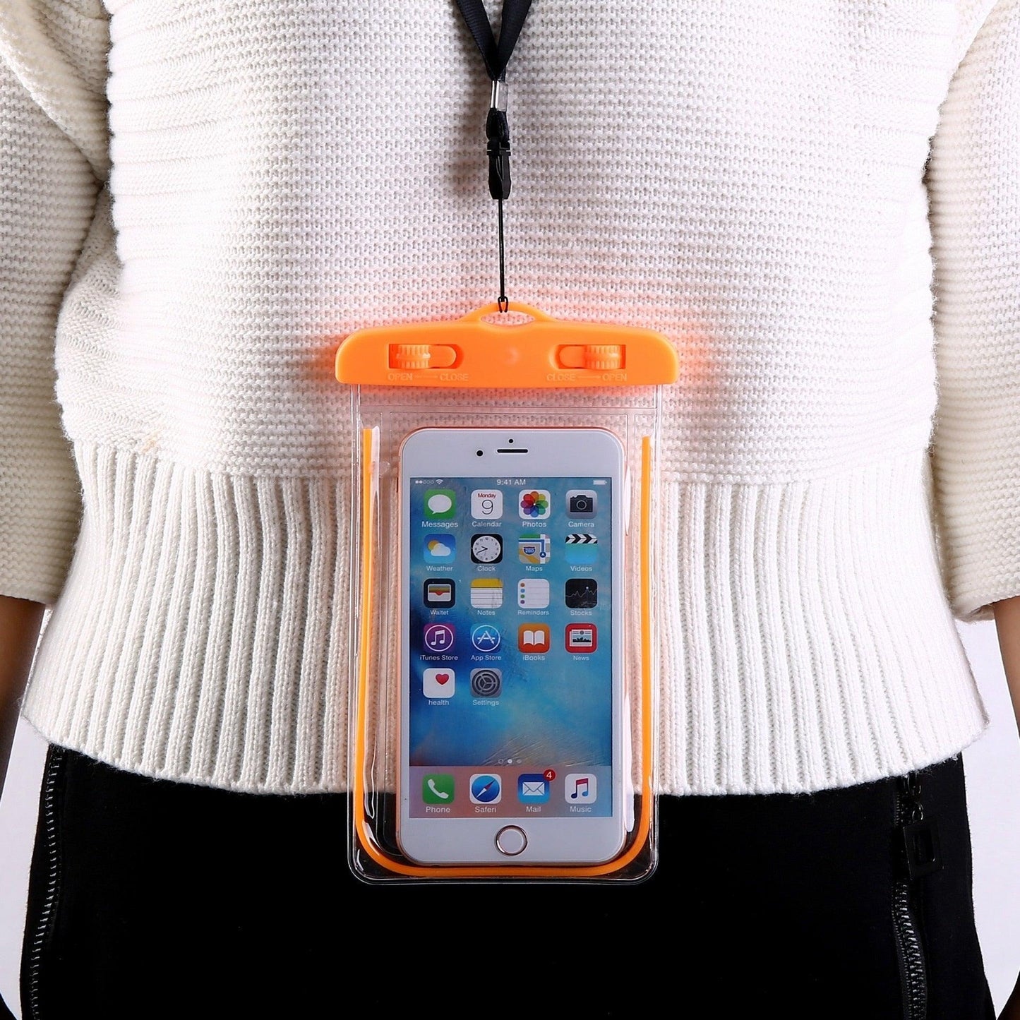 Person wearing STEVVEX waterproof phone pouch on neck strap outdoors — STEVVEX Gadgets via EOWD Autism Living