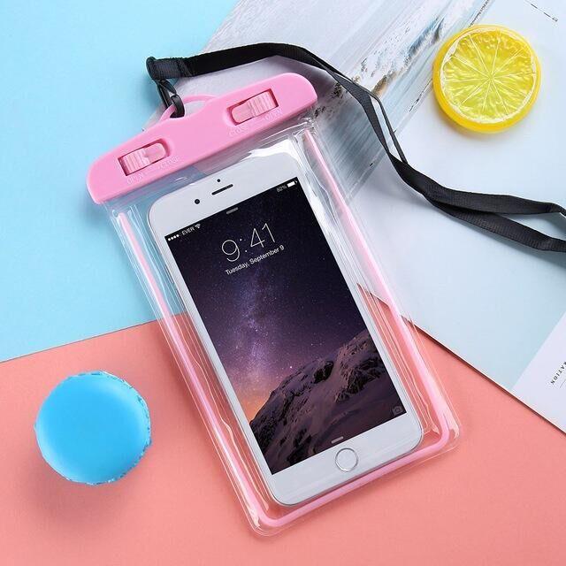 STEVVEX waterproof phone pouch with strap in pink shown with phone inside on pink background — STEVVEX Gadgets via EOWD Autism Living